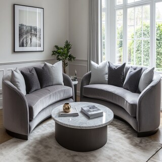 Contemporary Living Room Design with Curved Sofas and Marble Coffee Table